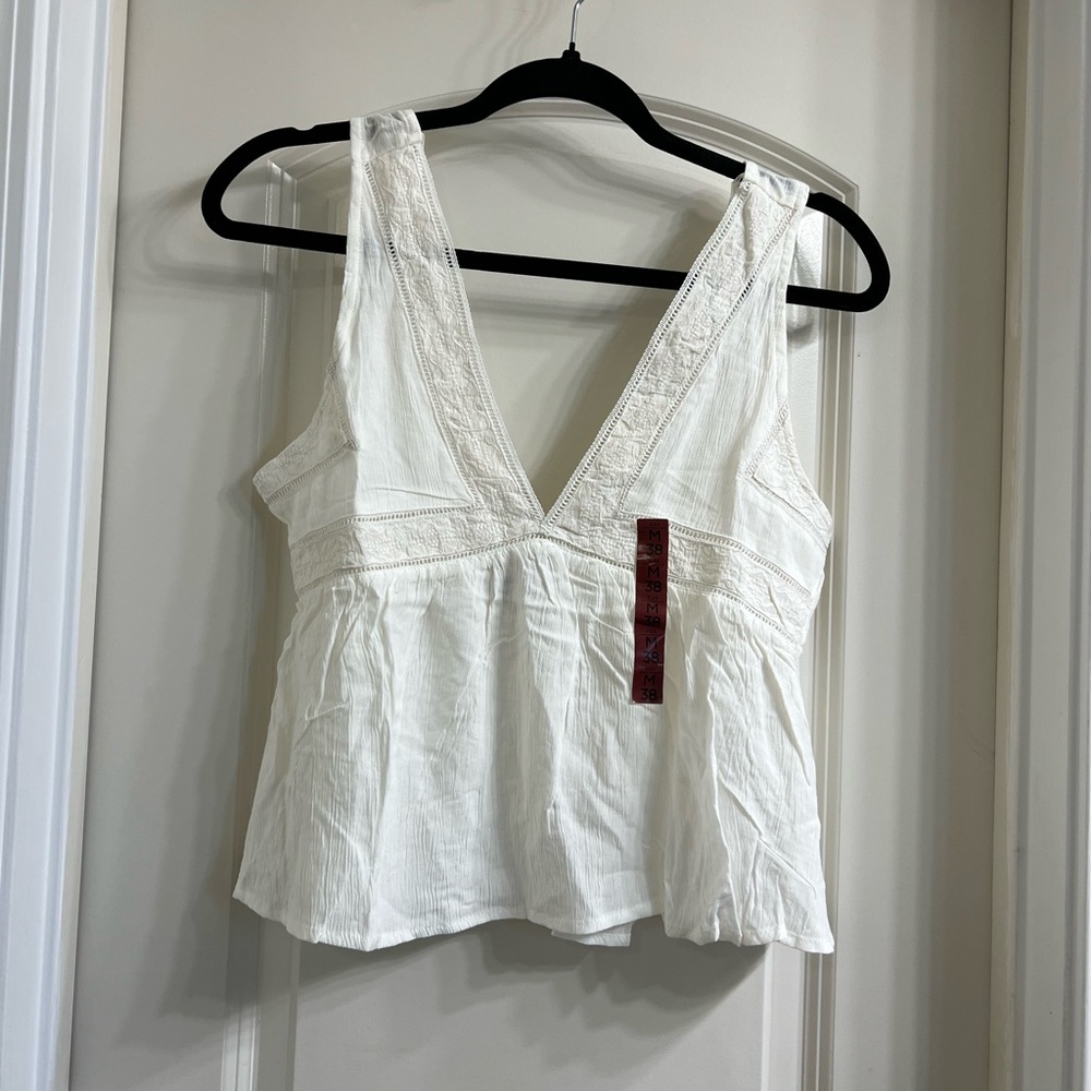 Melrose Place White Sleeveless V-Neck Top